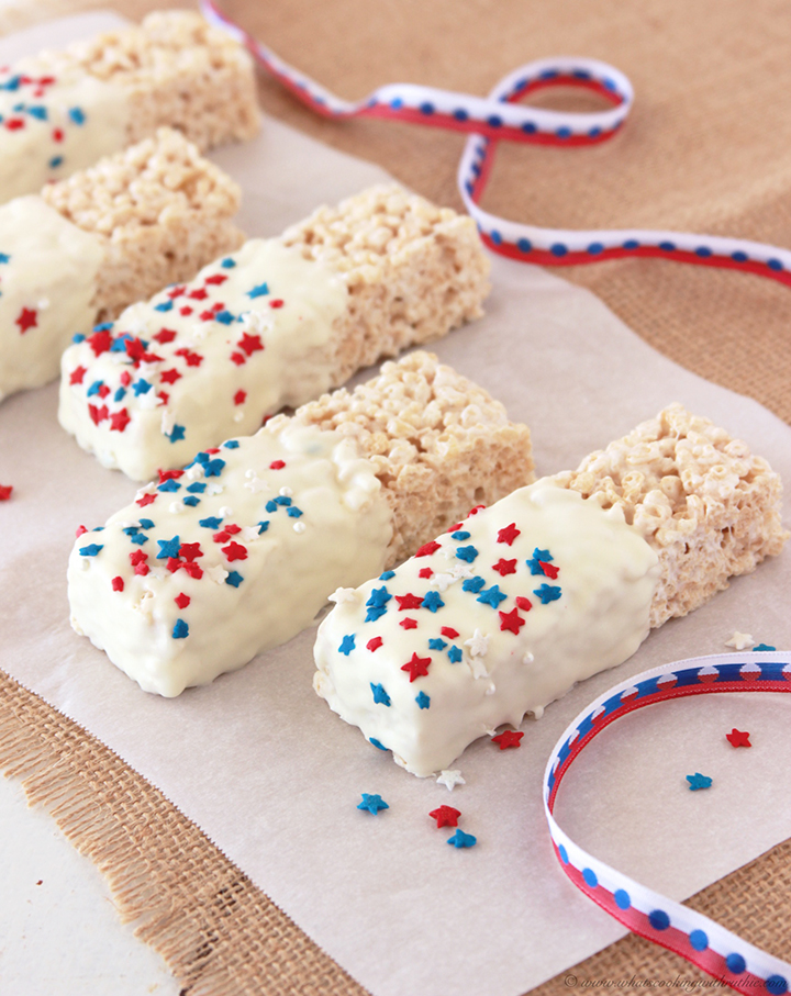 We've found 15 of the Best 4th of July Rice Krispie Treats.  Your friends and family at your Fourth of July party or summer family BBQ will love these Red White and Blue treats! These 15 yummy Patriotic Desserts are all amazing and gorgeous 4th of July treats.  Pin these easy to make Independence Day Rice Krispie Treats for later and follow us for more 4th of July Food Ideas. 