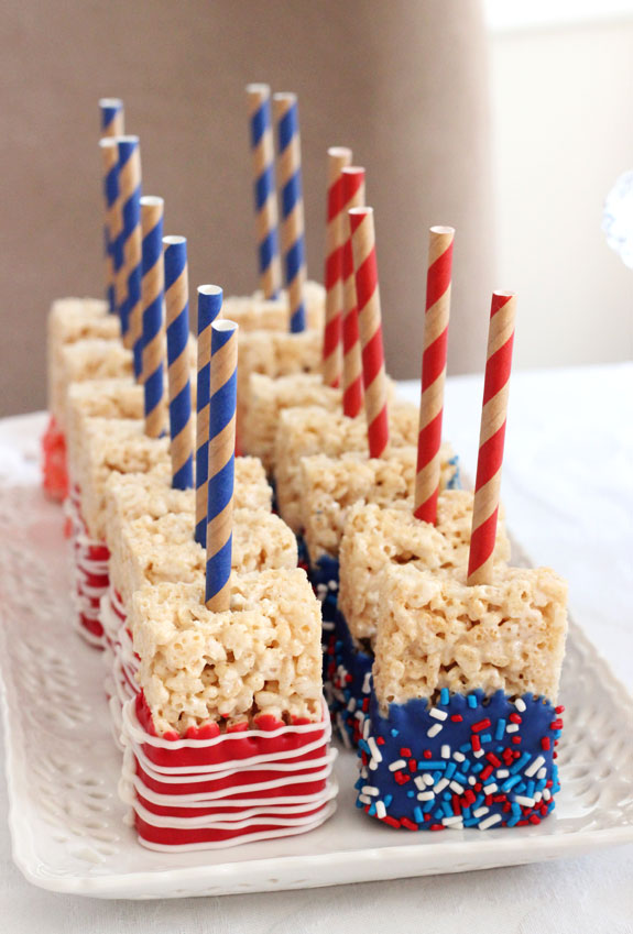 We've found 15 of the Best 4th of July Rice Krispie Treats.  Your friends and family at your Fourth of July party or summer family BBQ will love these Red White and Blue treats! These 15 yummy Patriotic Desserts are all amazing and gorgeous 4th of July treats.  Pin these easy to make Independence Day Rice Krispie Treats for later and follow us for more 4th of July Food Ideas. 